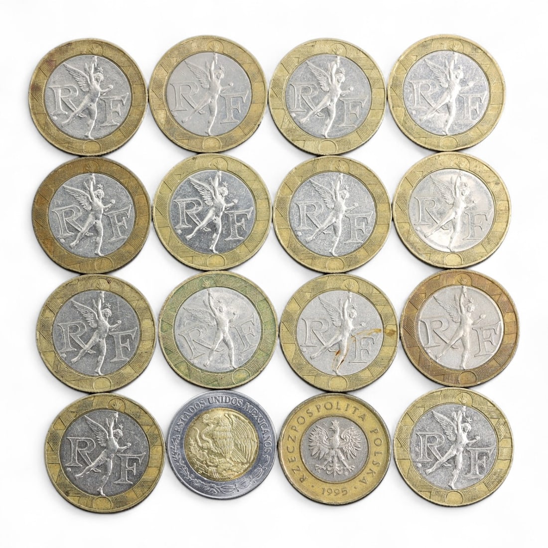 FRANCE: Republican Identity - Liberte Series 10 Franc Coin, 1988-2001, 20mm: Spanning over a decade of France's modern monetary history, this vibrant set of 16 bi-metallic 10 Franc coins offers a rich tribute to the ideals of the Fifth Republic. The reverse boldly declares "Li