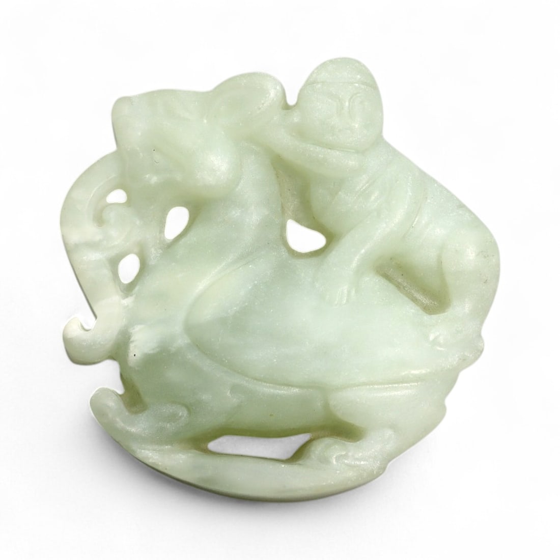 Chinese Jade Carving of a Boy Riding an Elephant, Qing Dynasty, 4.9cm, 47g: This delicately carved white nephrite jade piece depicts a young boy riding atop an elephant, a motif rich in symbolism throughout Chinese history. The elephant ("xiang") and child together signify bl