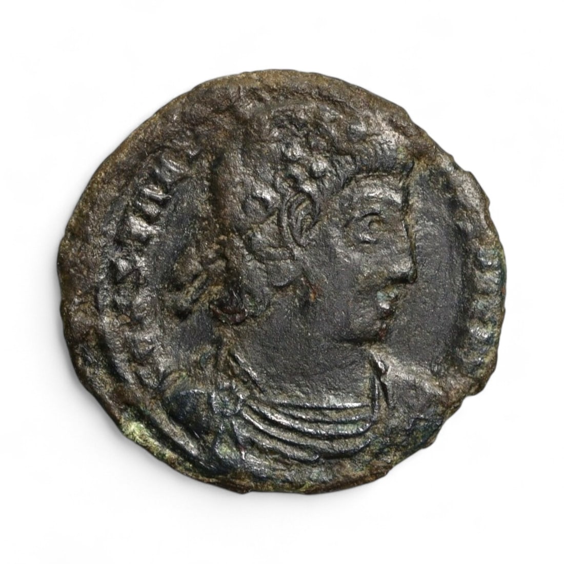 ROMAN EMPIRE: Imperial Authority - Bronze Coin, c. 1st-3rd Century AD, 17mm: Struck during the turbulent decades of the later Roman Empire, this 19mm bronze coin reflects the enduring symbolism of imperial control amidst crisis. Its compact yet deliberate design likely feature