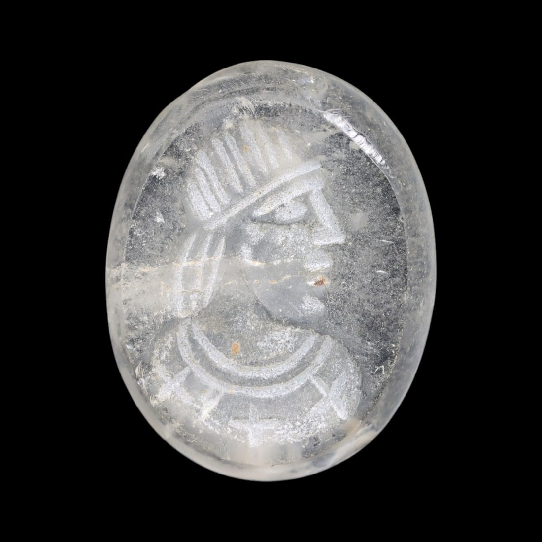 Ancient Greco-Persian Intaglio Portrait Seal in Rock Crystal, c. 5th-3rd Century BCE, 4.6g: This elegantly carved intaglio seal in transparent rock crystal, dating to the 5th-3rd century BCE, represents a unique fusion of Greco-Persian artistic traditions. Cut in an oval cabochon form and en