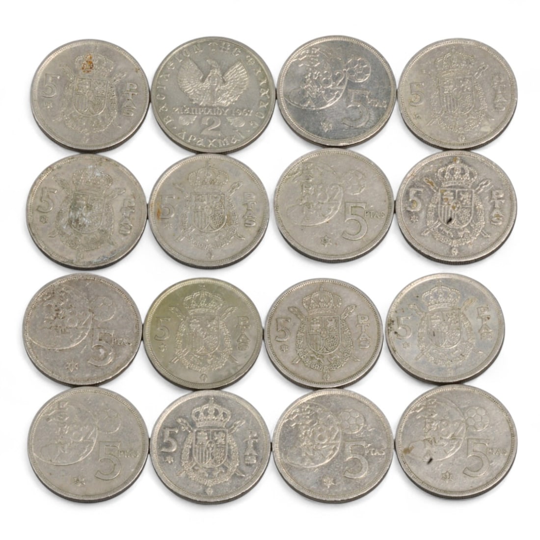 SPAIN: Bourbon Restoration & Transitional Iconography - Juan Carlos I 5 Pesetas Coin Lot, 1975-1990s: This 16-coin lot features a broad cross-section of Spain's post-Franco 5 Pesetas issues, unified by the profile of King Juan Carlos I-symbol of democratic restoration and constitutional monarchy. Span