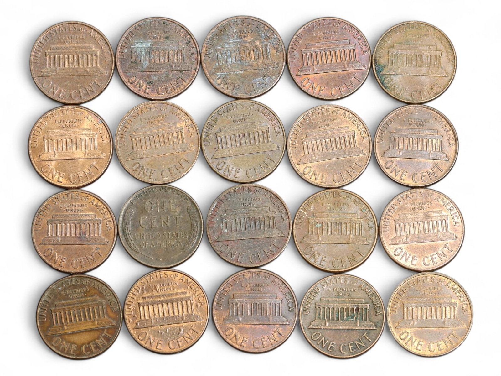 UNITED STATES: Lincoln Memorial - Centenary of Union Legacy 1 Cent Coin, 1950-1991, 20mm (Lot of 20): Struck across the ideological arc of Cold War America, this 20-coin grouping of Lincoln Memorial cents serves as both circulating currency and civic monument. The obverse preserves Victor D. Brenner's