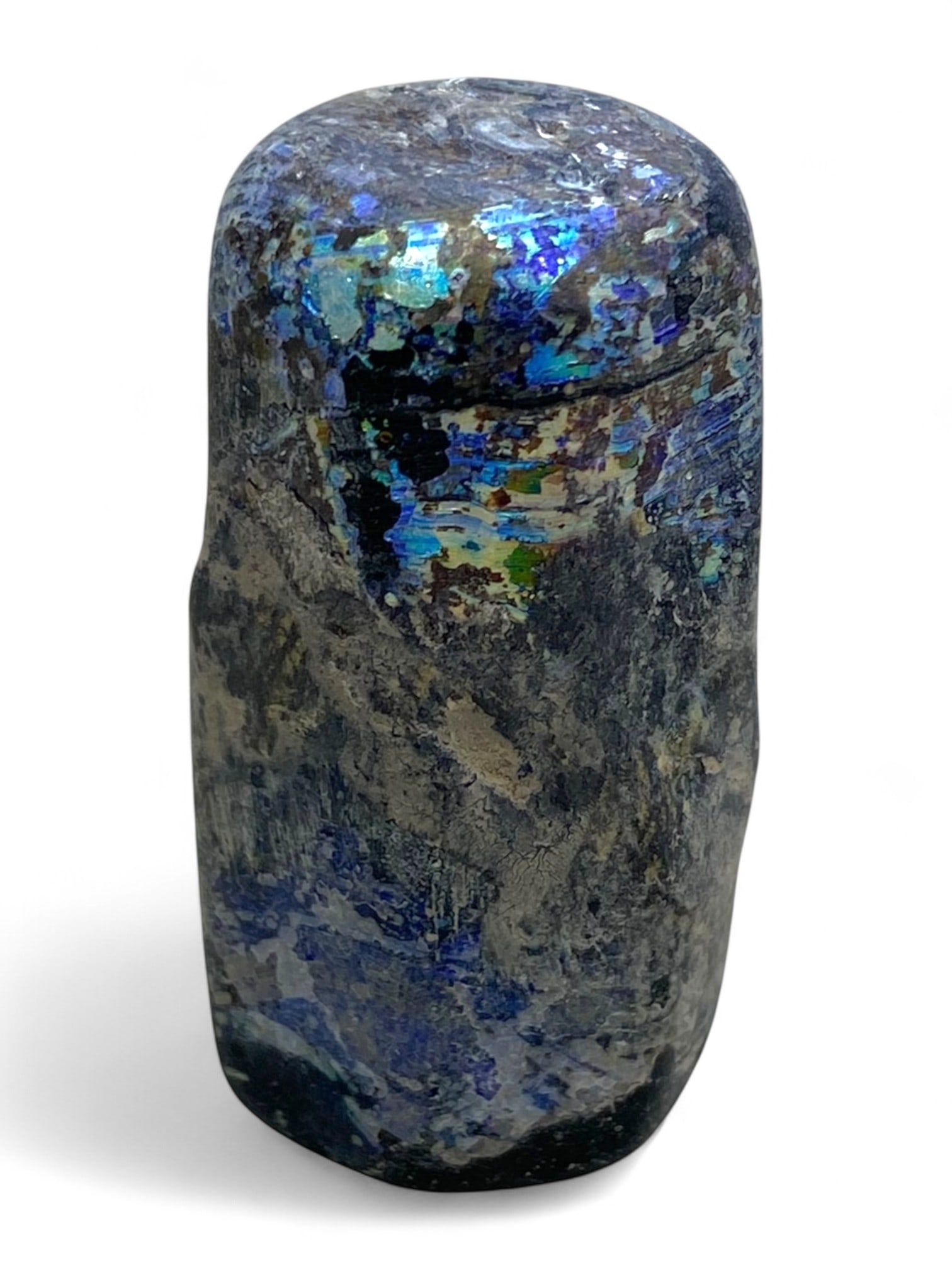 Ancient Roman Deep Cobalt Glass Cosmetic Tube, c. 1st-3rd Century CE, 25g: This remarkable Roman glass cosmetic tube, crafted entirely from thick cobalt glass and measuring approximately 4.5 cm in height, is a rare survivor from the 1st-3rd century CE. Likely used to store h