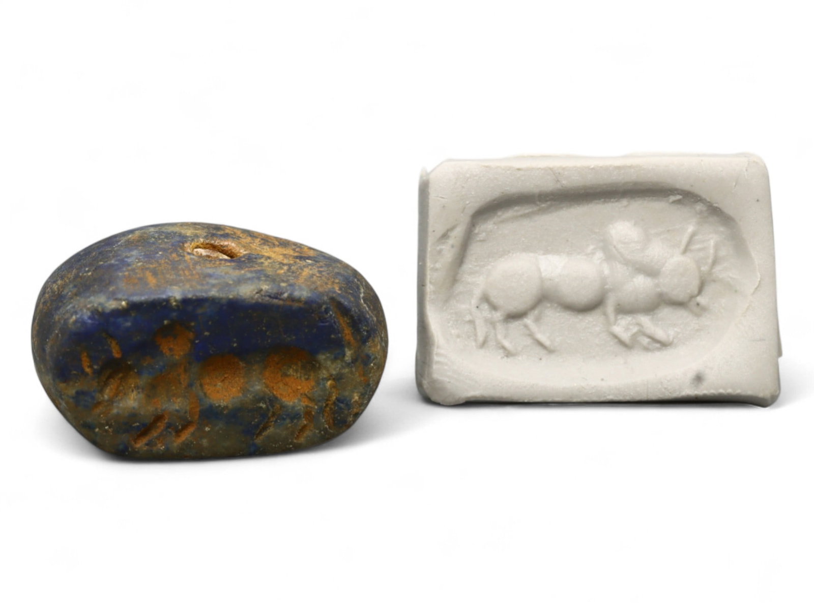 Ancient Elamite Lapis Lazuli Stamp Seal of Bull, c. 2500-1800 BCE, 9g: This beautifully carved lapis lazuli stamp seal dates to the Elamite-Indus interaction period (c. 2500-1800 BCE). Measuring 2 x 1 cm and weighing 9 grams, it depicts a powerful bull in profile, render