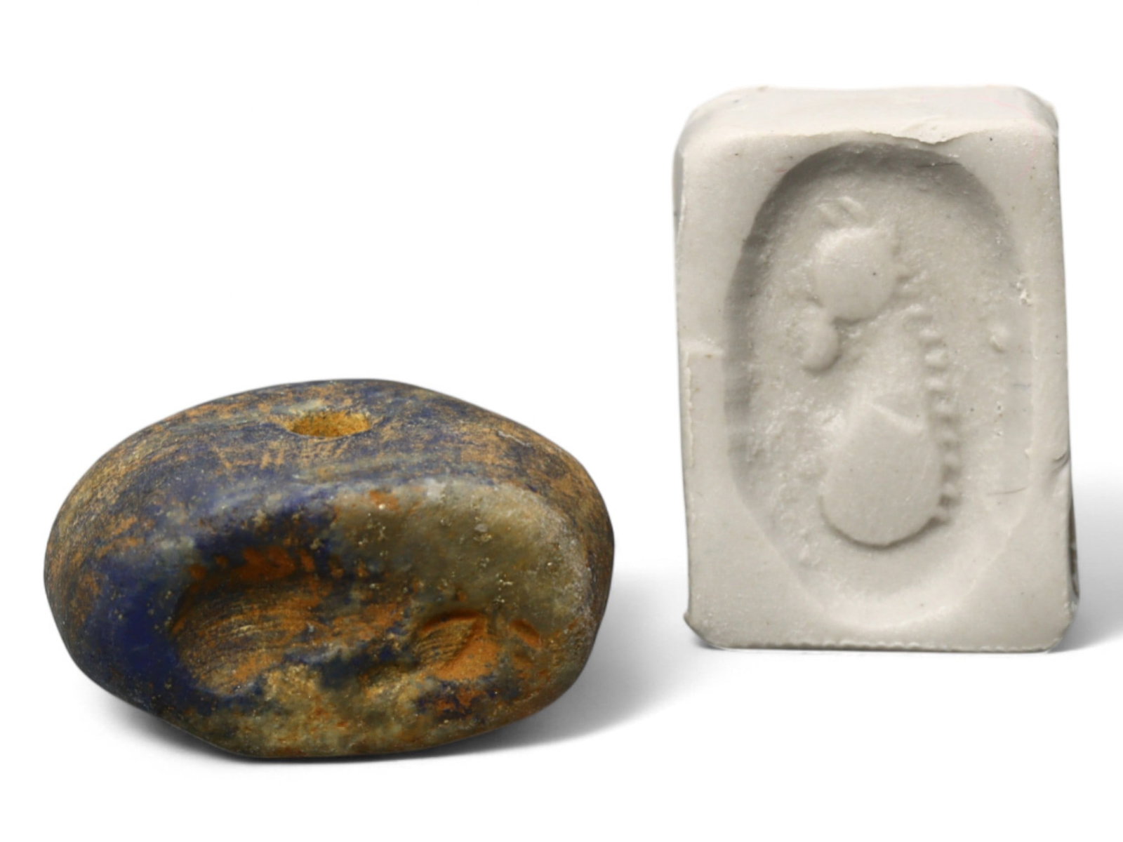 Ancient Elamite Lapis Lazuli Stamp Seal of Serpent Motif, c. 2500-1800 BCE, 8g: This enigmatic lapis lazuli stamp seal, dating to the Elamite-Indus interaction period (c. 2500-1800 BCE), bears a striking coiled serpent design. Measuring 2 x 1 cm and weighing 8 grams, its engraved