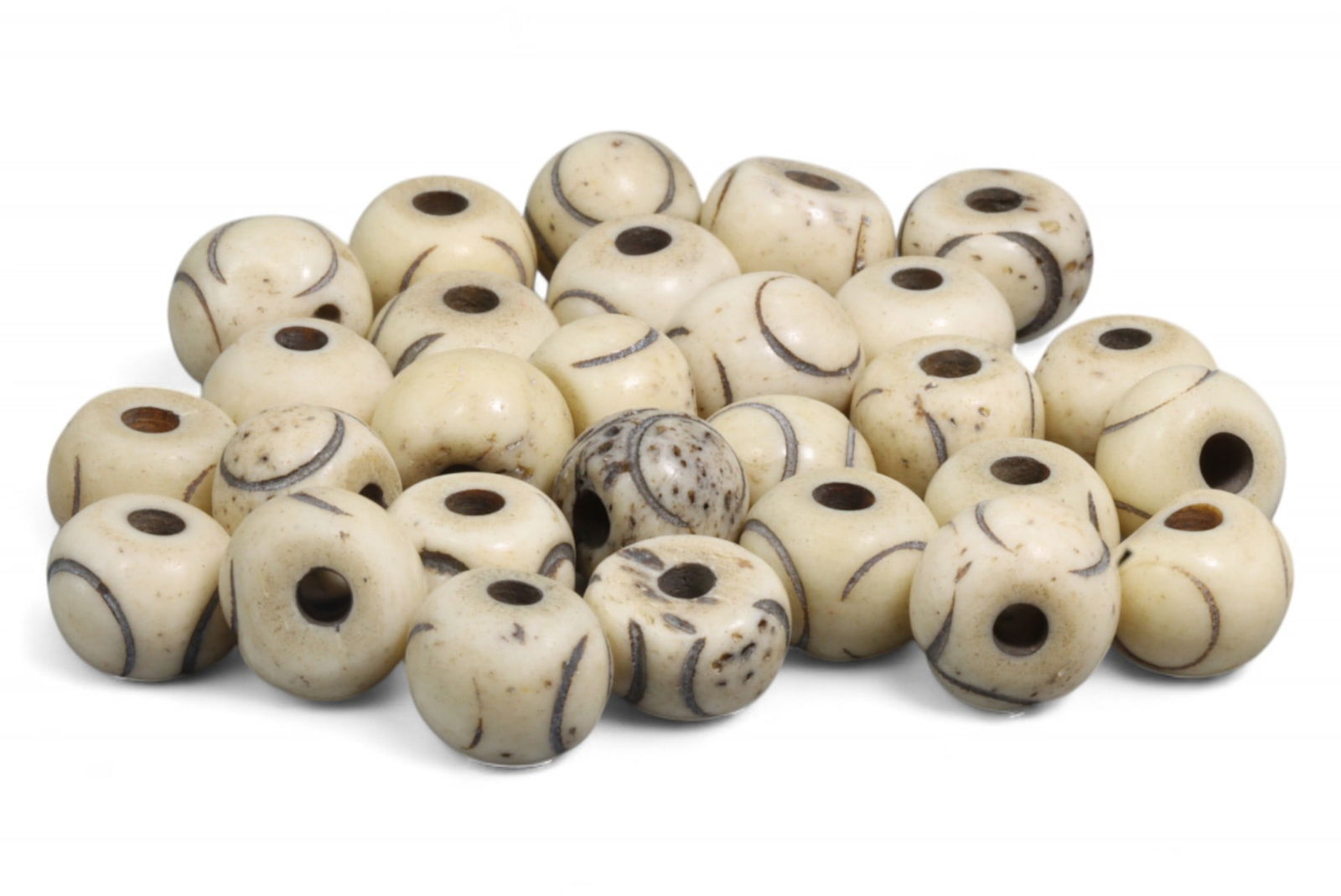 Vintage Tibetan Moonline Pattern Bone Bead Bracelet, c. Mid-20th Century, 12g: This elegant vintage Tibetan bracelet features hand-carved bone beads in a soft ivory tone, each etched with fine crescent-like lines known as "moonline" patterns. These minimalist curves suggest the