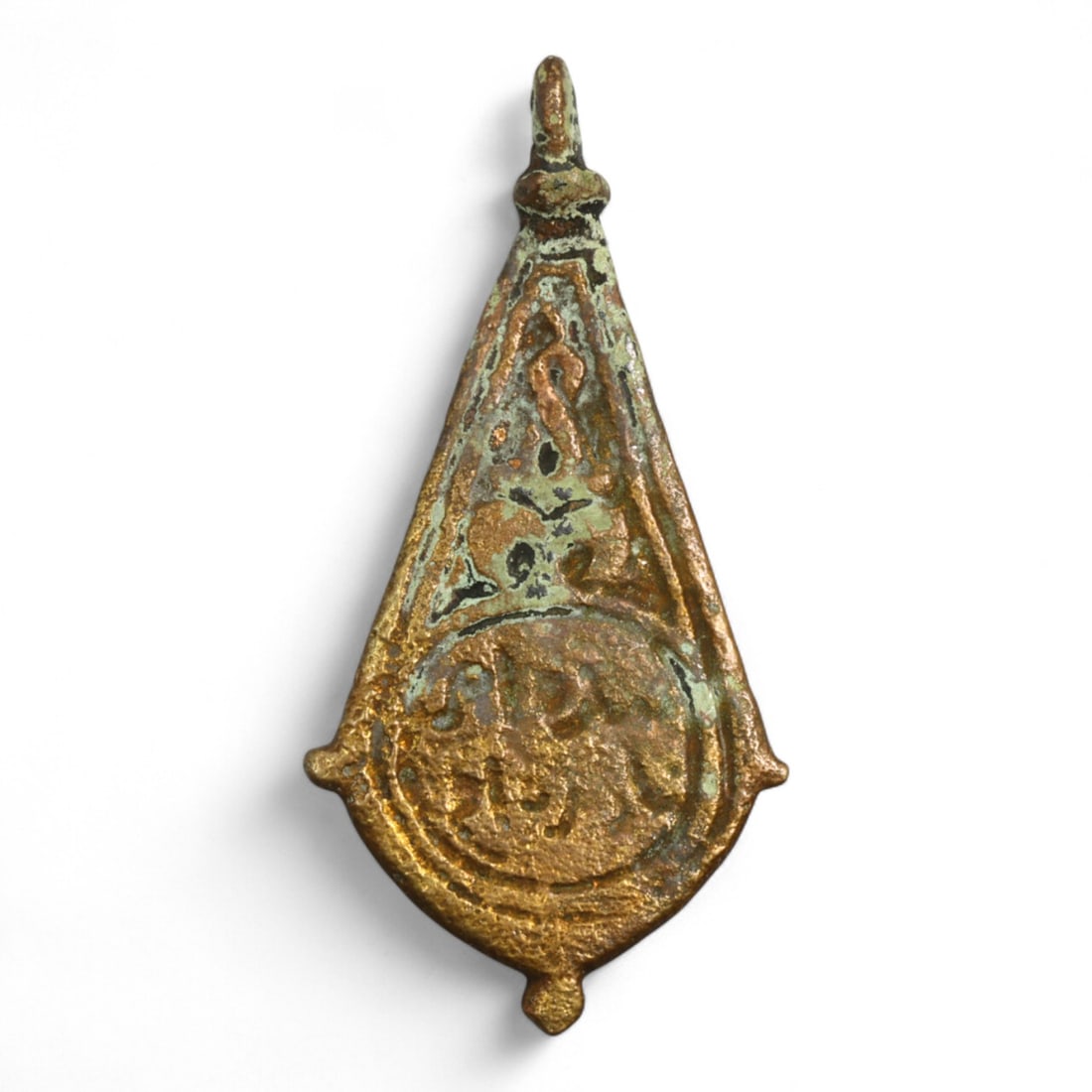 Ancient Byzantine Bronze Amulet with Gilded Highlights and Inscribed Motifs, 6th-9th Century CE, 7g: This finely crafted bronze amulet, measuring 5 cm in length and weighing 7 grams, originates from the Byzantine Empire, a culture renowned for combining devotion with artistry. Dating to between the 6