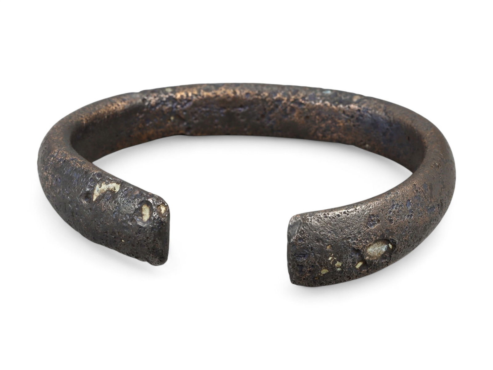 Ancient Parthian Heavy Bronze Cuff Bracelet, c. 2nd Century BCE - 1st Century CE, 66g: This substantial bronze cuff bracelet, dating to the Parthian Empire between the 2nd century BCE and 1st century CE, is a powerful example of early Iranian craftsmanship during a time of cultural fusi