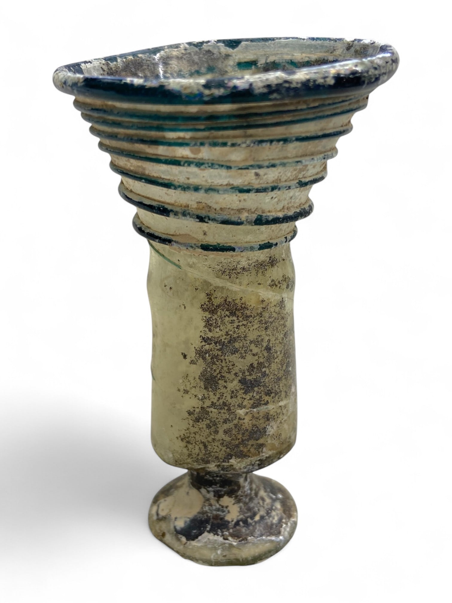 Ancient Roman Ribbed Funnel-Mouthed Glass Goblet, c. 1st-3rd Century CE, 50g: This striking ancient Roman glass goblet, dating to the 1st-3rd century CE, showcases the technical ingenuity and refined aesthetics of imperial glass artisans. Mold-blown in pale translucent glass, t