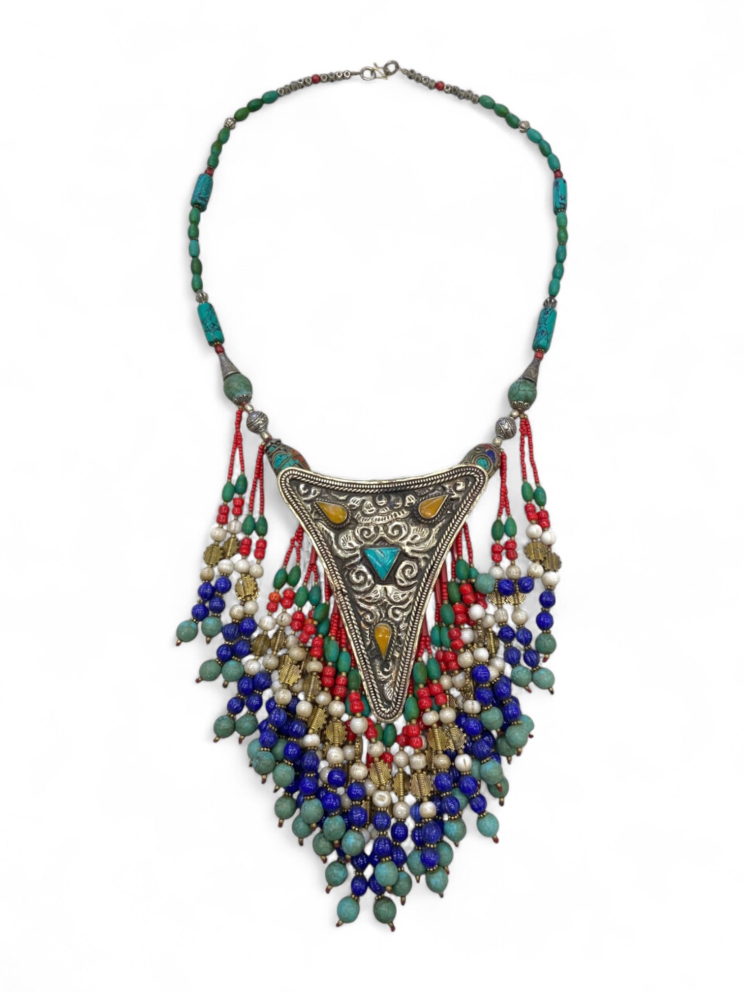 Afghan Tribal Triangle Amulet Pendant Necklace, Multi-Gem Beaded Cascade - 276g: Radiating with ceremonial power and kinetic movement, this bold necklace from Afghanistan's tribal regions centers on a dramatic triangle-shaped amulet pendant, richly engraved with traditional foliat