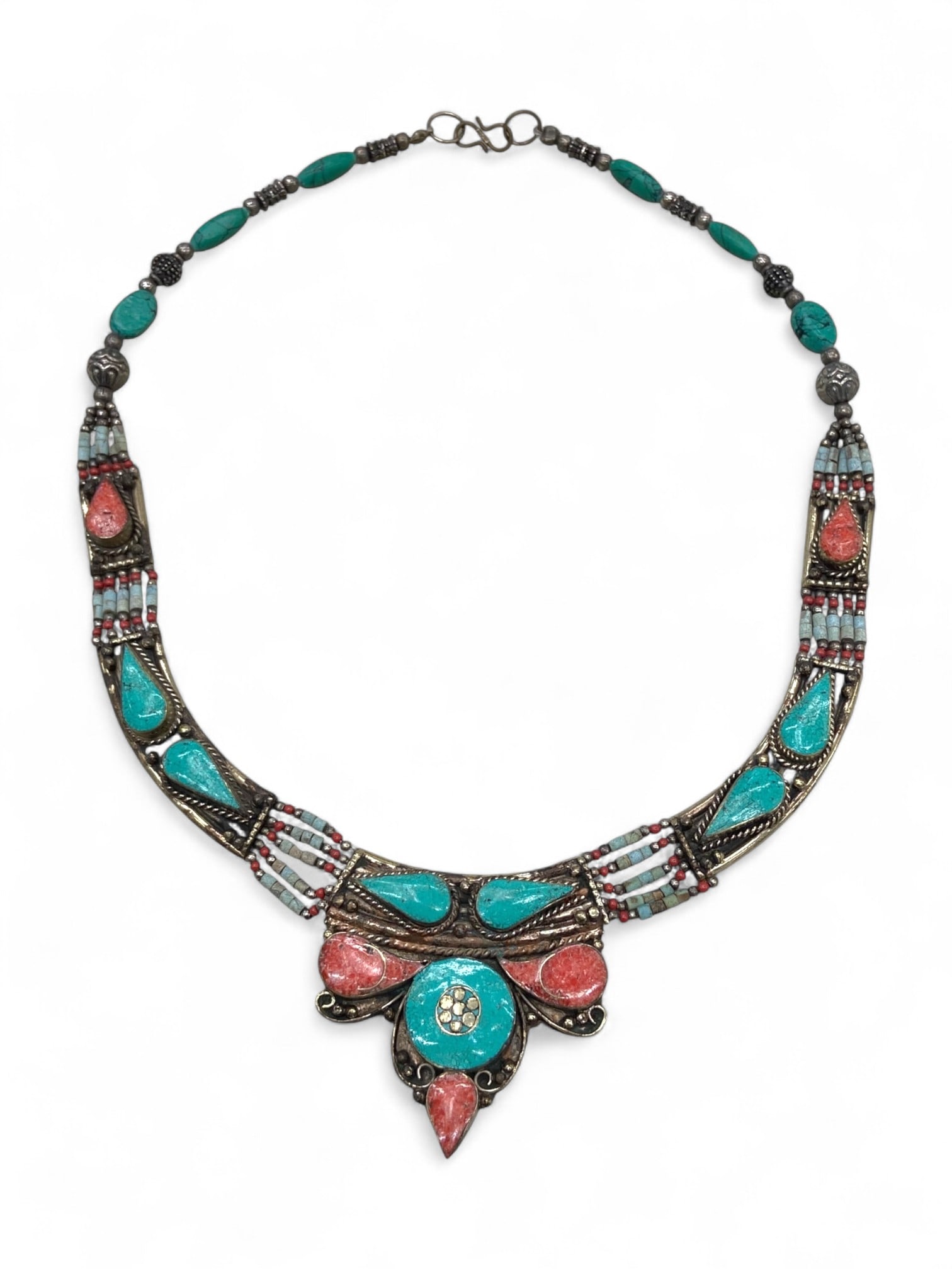 Tibetan Floral Emblem Mosaic Coral Turquoise Inlay Necklace, Himalayan Origin, 109g: A celebration of Himalayan artistry, this vibrant necklace draws from the deep spiritual and decorative traditions of Tibetan culture. The piece is adorned with inlays of vivid red coral and turquoise