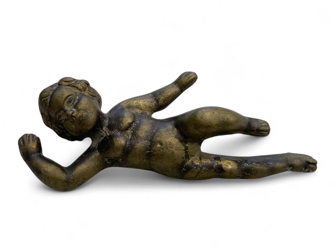 Antique Classical Greco-Roman Reclining Eros Solid Bronze Statuette, c. 1st-3rd Century CE, 550g: This masterfully cast bronze statuette of a reclining Eros embodies the elegance and humanism of Classical antiquity, dating from the 1st to 3rd century CE. Measuring 15 cm in length and weighing a su