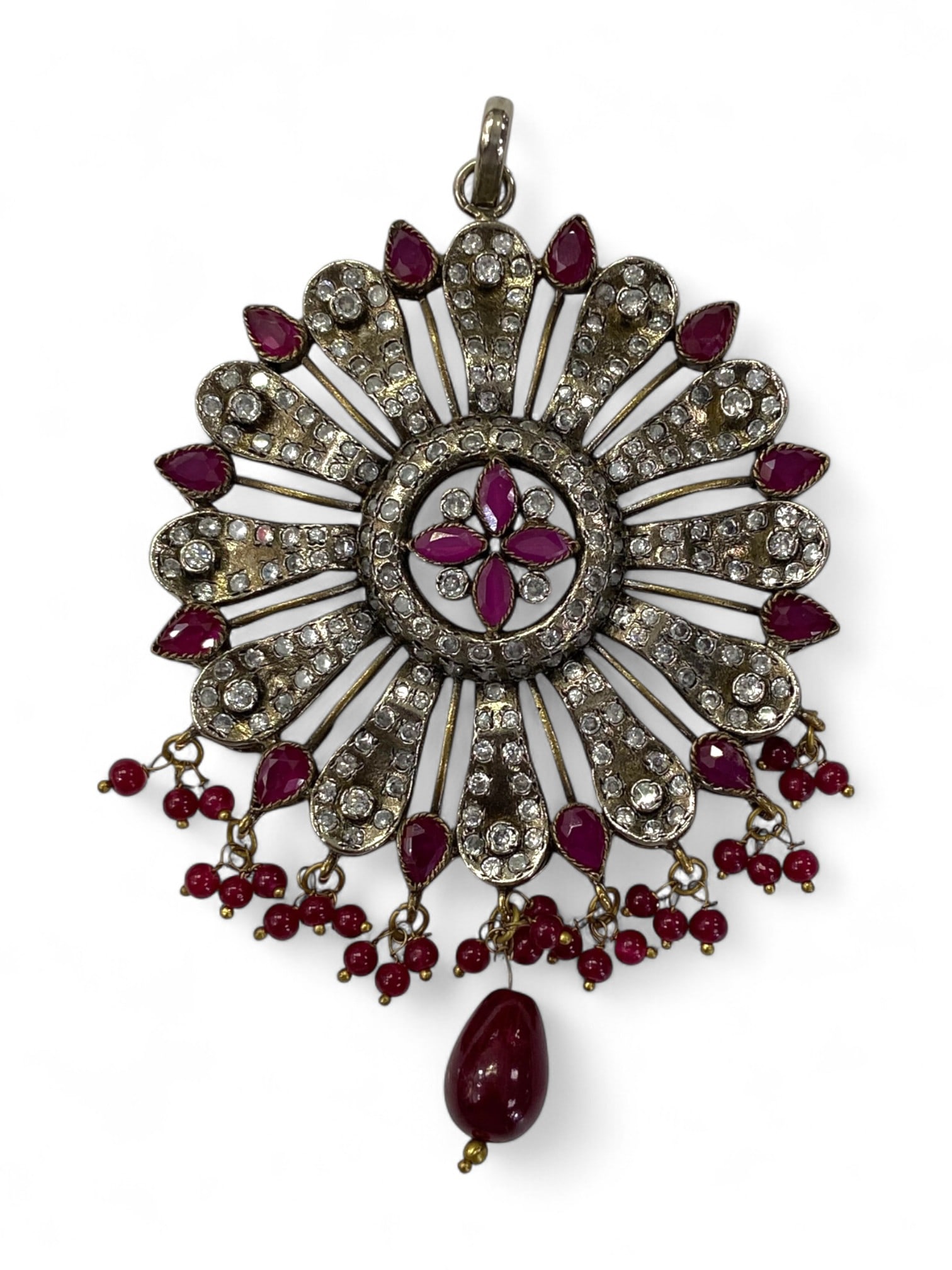 Indian Deccan Style Radiant Sunburst Pendant with Red Beads and Gilt Accents, 38g: This spectacular pendant radiates the vibrant elegance of South India's Deccan-inspired artistry. Measuring 10 cm in height and weighing 38 grams, its form captures a starburst explosion of ornamental