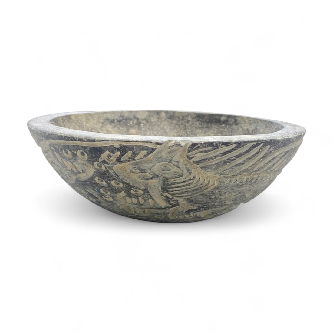 Ancient Jiroft Winged Predator Motif Carved Schist Bowl, c. 3rd Millennium BCE - 409 g: This exceptional carved schist bowl originates from the ancient Jiroft culture of southeastern Iran, dating to the 3rd millennium BCE. The Jiroft civilization is renowned for its intricate stonework,
