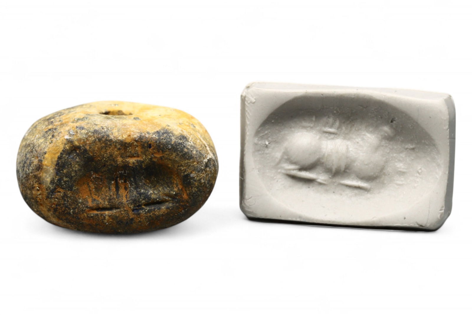 Ancient Ur III Reclining Bull Motif Domed Chlorite Stamp Seal, c. 2100-2000 BCE, 13.77g: This powerful domed stamp seal, carved from mottled chlorite and dating to the Ur III period (c. 2100-2000 BCE), reflects the economic and religious significance of the bull in Mesopotamian culture. I