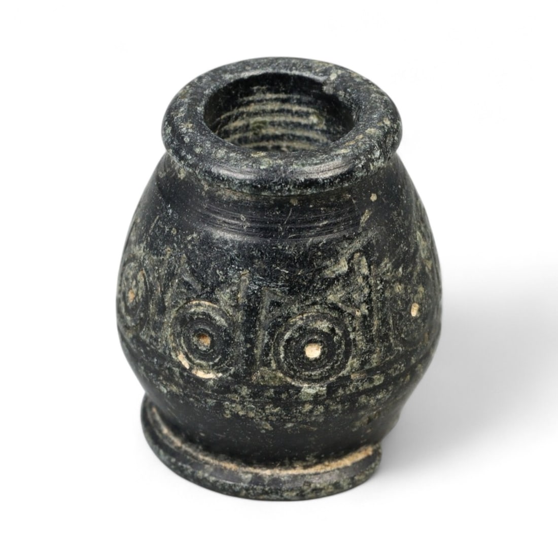 Ancient Near Eastern Eye Motif Barrel Bead in Black Stone, c. 2nd Millennium BCE, 4.6g: This striking barrel-shaped bead, measuring approximately 1.7 cm (0.67 inches) tall and weighing 4.6 grams, is an evocative relic of the ancient Near East, dating to the 2nd millennium BCE. Meticulous