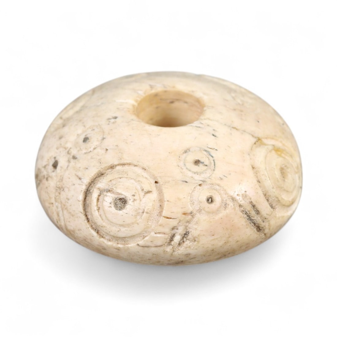 Ancient Parthian Symbolic Domed Bronze Spindle Whorl, c. 2nd-3rd Century CE, 1.8cm, 2.7g: This compact and intricately cast spindle whorl hails from the Parthian Empire, a powerful civilization that flourished across Iran and Mesopotamia from the 3rd century BCE to the 3rd century CE. Dati