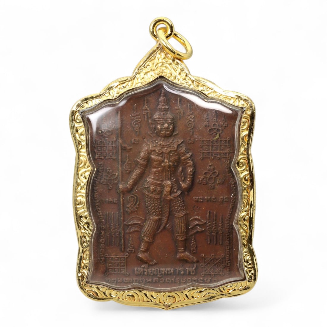 Vintage Thai Yaksha Guardian Demon Amulet in Ornate Gold Frame, late 20th Century, 33g: This bold vintage Thai amulet features a detailed representation of a Yaksha - a guardian demon from Buddhist and Hindu mythology - standing in full regalia with a weapon in hand, symbolizing vigilanc
