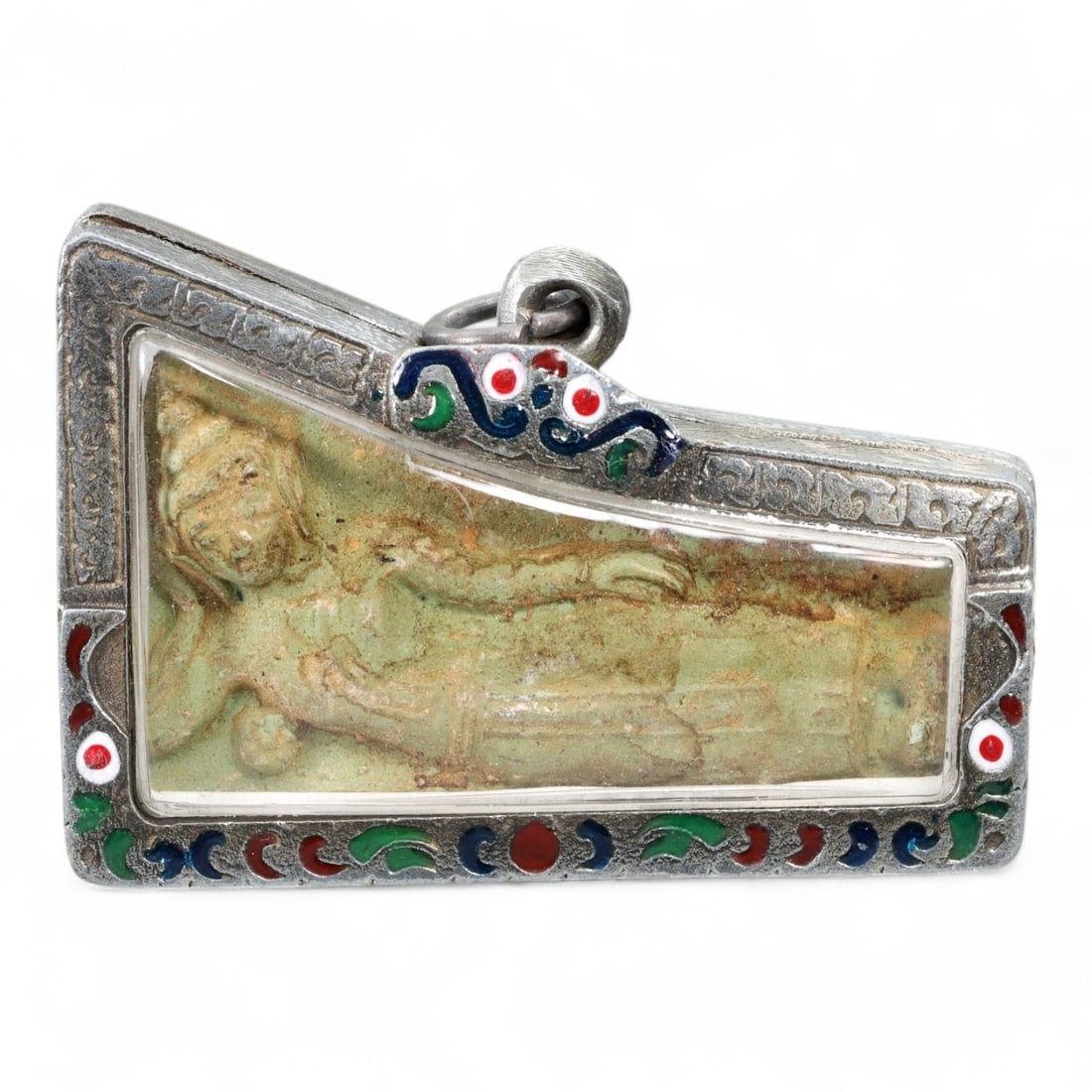 Antique Thai Reclining Buddha Amulet in Enamel Silver Frame, c. 19th-20th Century, 55g: This captivating Thai amulet presents a serene depiction of the reclining Buddha, a symbol deeply rooted in Southeast Asian spiritual tradition. Crafted in green-hued terracotta or clay, the figure's