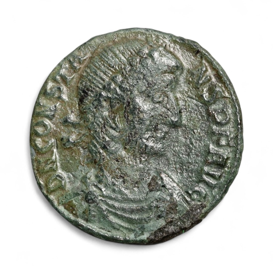 ROMAN EMPIRE: Imperial Authority - Bronze Coin, c. 1st-3rd Century AD, 18mm: Struck during the turbulent decades of the later Roman Empire, this 19mm bronze coin reflects the enduring symbolism of imperial control amidst crisis. Its compact yet deliberate design likely feature