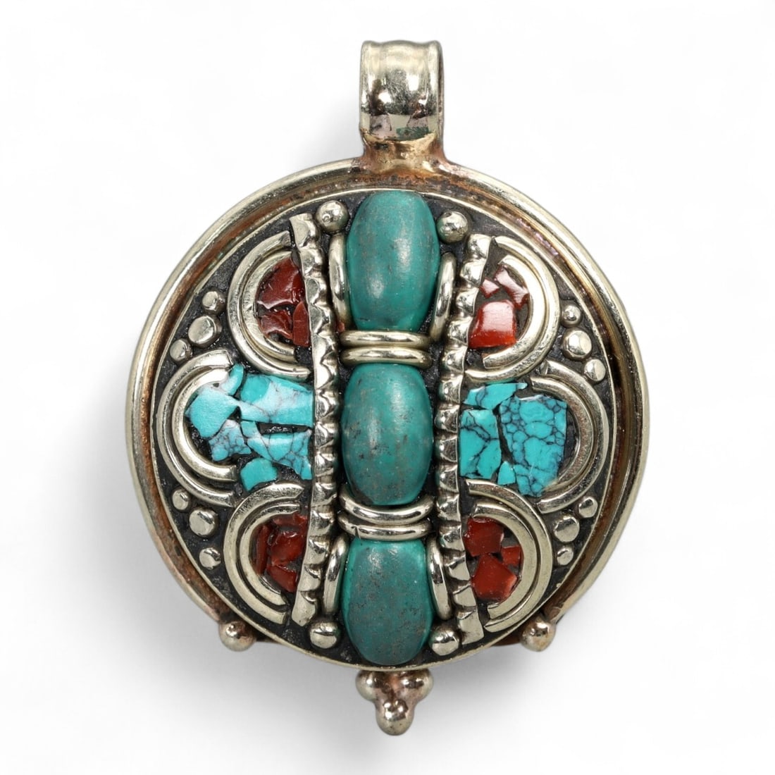 Tibetan Vertical Turquoise Coral Inlay Silver Pendant, Sacred Pillar Motif, 20g: This Tibetan pendant features a distinctive vertical design that evokes the structure of a sacred pillar or prayer column, symbolizing strength, balance, and ascension. Crafted in a round frame, it sh