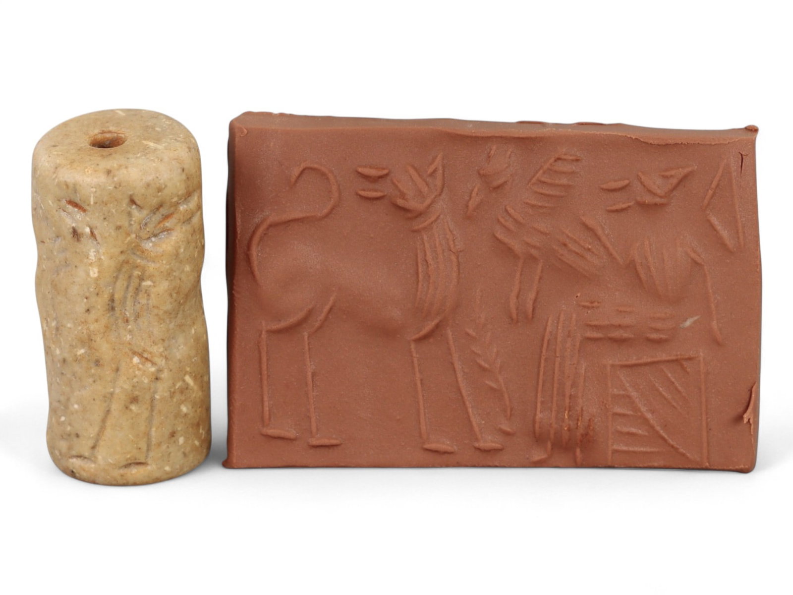 Ancient Mesopotamian Administrative Cylinder Seal, c. 2nd-1st Millennium BCE, 15g: This authentic cylinder seal from ancient Mesopotamia dates to the 2nd to 1st millennium BCE, a time when the art of carving miniature narratives on stone reached remarkable levels of refinement. Seal
