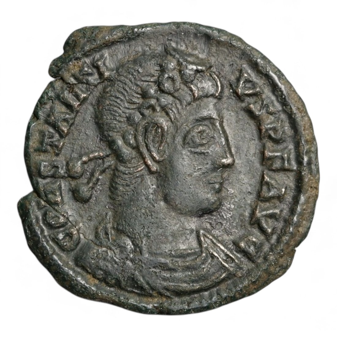 ROMAN EMPIRE: Imperial Authority - Bronze Coin, c. 1st-3rd Century AD, 16mm: Struck during the turbulent decades of the later Roman Empire, this 19mm bronze coin reflects the enduring symbolism of imperial control amidst crisis. Its compact yet deliberate design likely feature