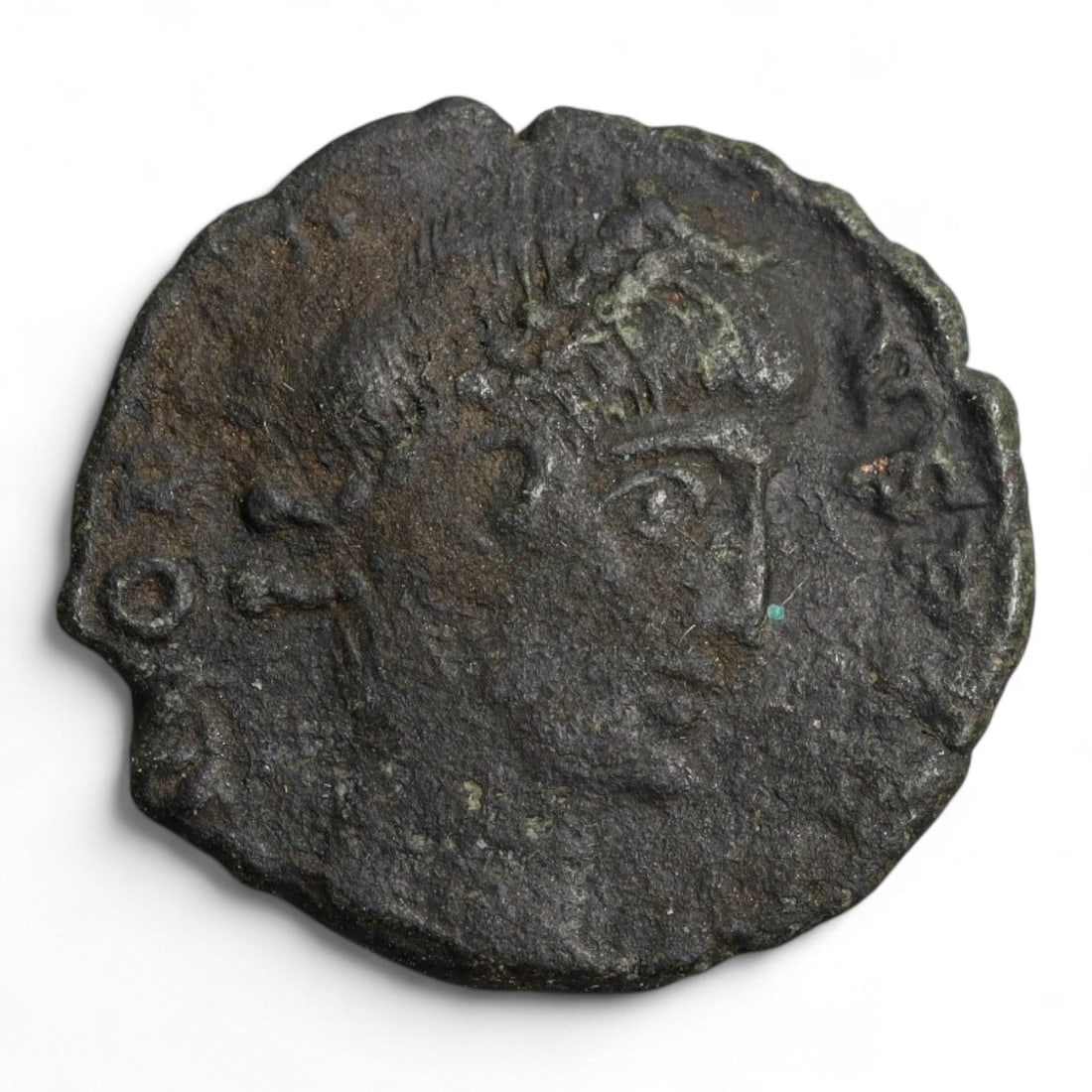 ROMAN EMPIRE: Imperial Authority - Bronze Coin, c. 1st-3rd Century AD, 15mm: Struck during the turbulent decades of the later Roman Empire, this 19mm bronze coin reflects the enduring symbolism of imperial control amidst crisis. Its compact yet deliberate design likely feature