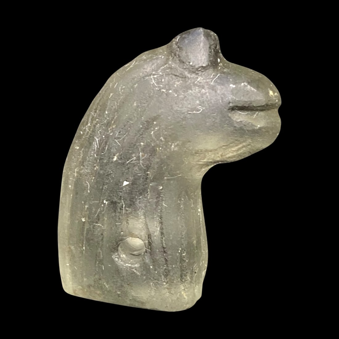 Ancient Sasanian Rock Crystal Camel Head Amulet, c. 3rd–6th Century CE, 5g: This delicately carved rock crystal amulet, dating to the Sasanian Empire (c. 3rd–6th century CE), is shaped as the head and neck of a camel, one of the most vital animals of the ancient Near East. 