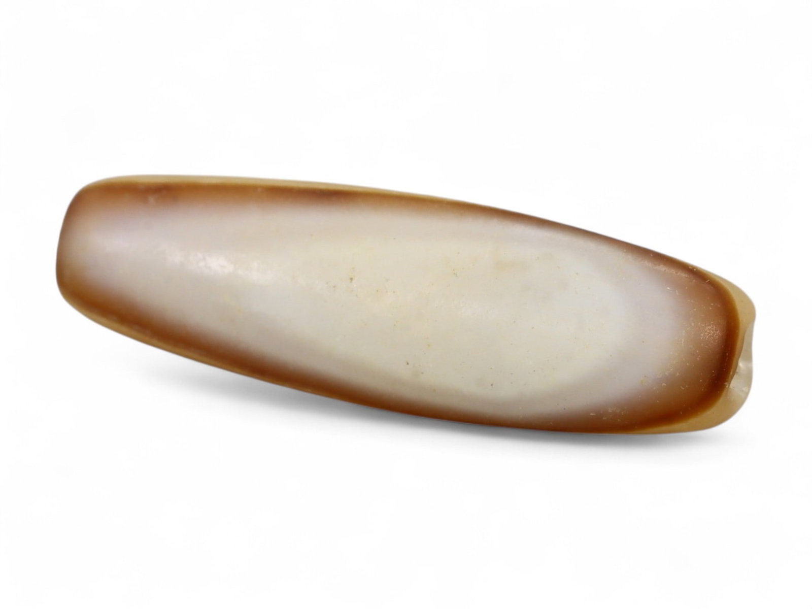 Ancient Persian Banded Agate Bead, Parthian-Roman Period c. 1st-3rd Century CE, 2cm, 1g: This elegant banded agate bead, originates from Persia during the Parthian-Roman cultural horizon of the 1st-3rd century CE. Agate, with its natural striations and layered beauty, was one of the most 