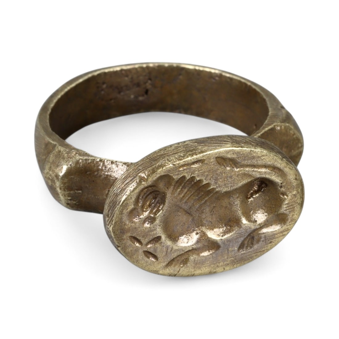 Antique Qajar Persian Brass Intaglio Lion Signet Ring, c. 19th-20th Century 8g: This antique brass signet ring, dating to the Qajar period (19th-20th century), bears the powerful image of a lion in raised intaglio on its oval bezel. The lion, a deeply symbolic figure in Persian c