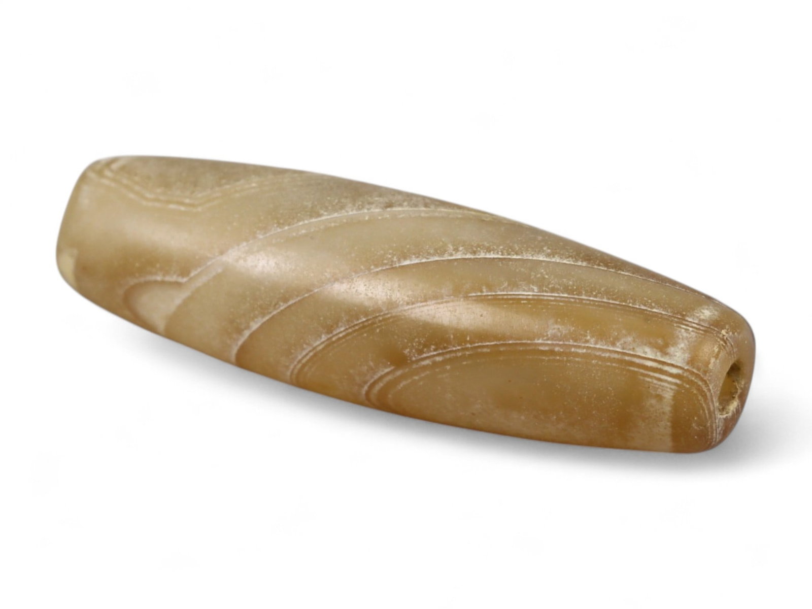 Ancient Persian Banded Agate Bead, Parthian-Roman Period c. 1st-3rd Century CE, 2cm, 1g: This elegant banded agate bead, originates from Persia during the Parthian-Roman cultural horizon of the 1st-3rd century CE. Agate, with its natural striations and layered beauty, was one of the most 