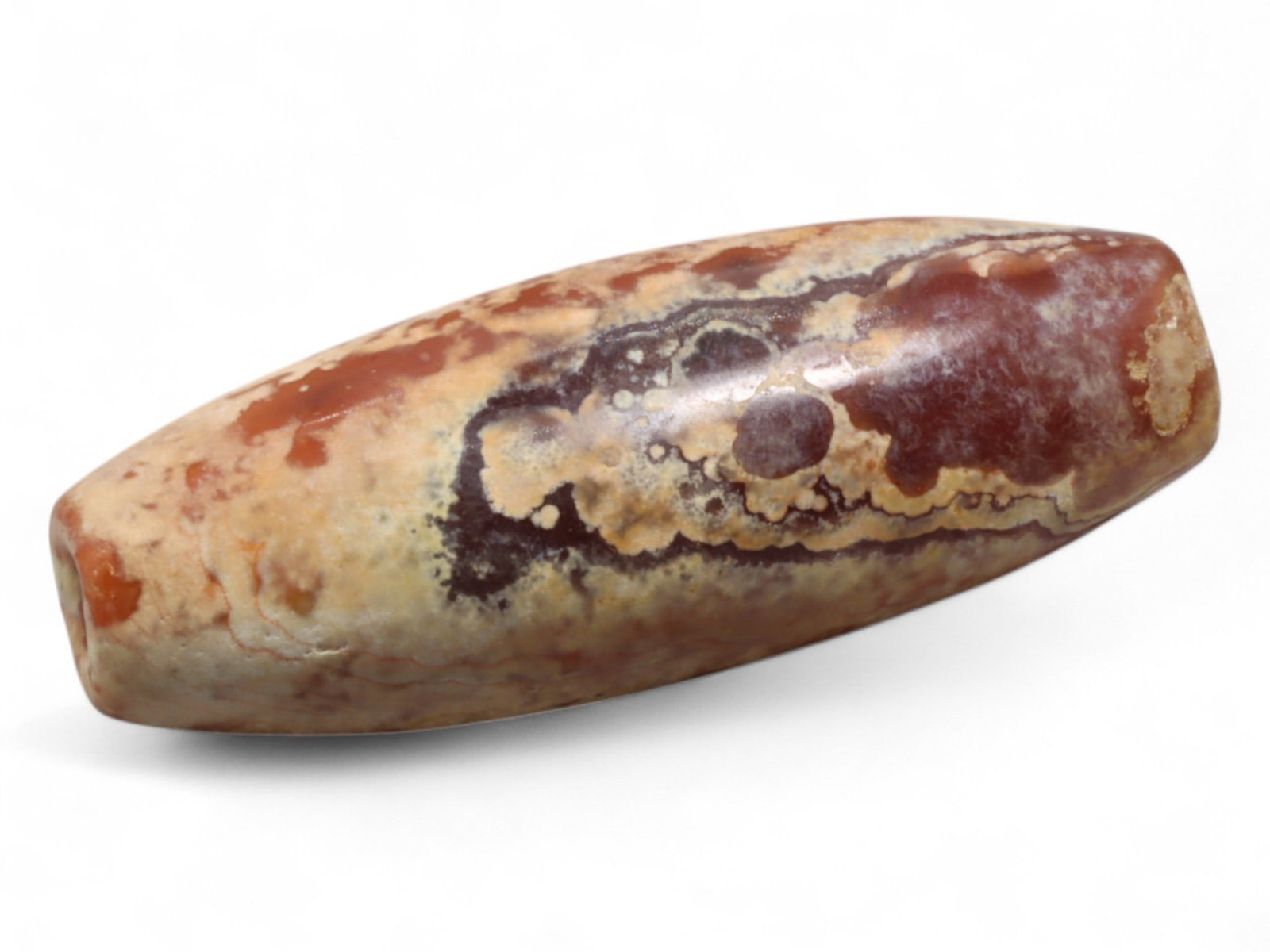 Ancient Achaemenid Persian Carnelian Bicone Bead, c. 6th-4th Century BCE, 3.1cm, 6g: This finely carved bicone bead of mottled carnelian, originates from the Achaemenid Persian Empire, c. 6th-4th century BCE. Carnelian was one of the most treasured stones in antiquity, associated with
