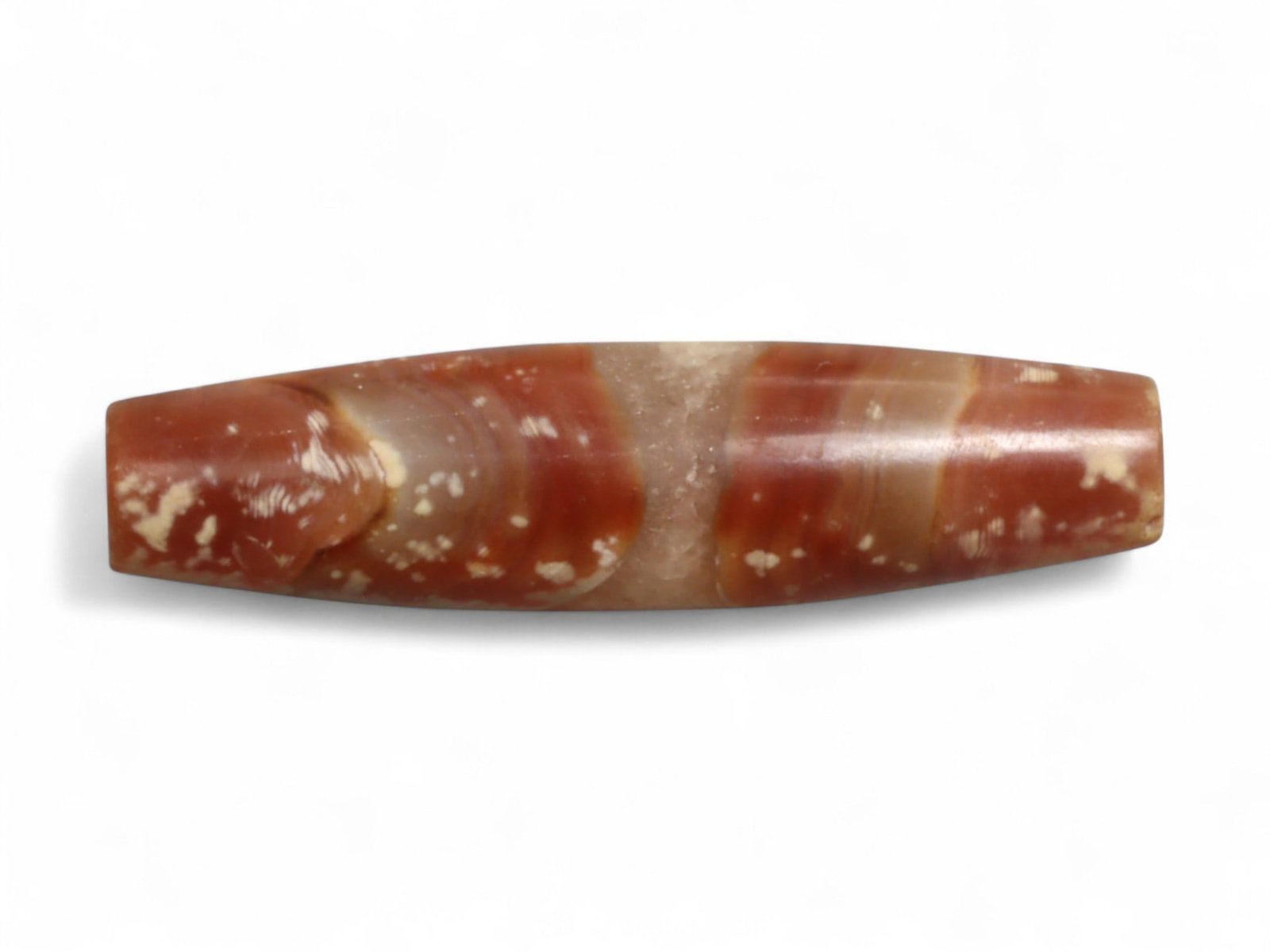 Ancient Achaemenid Persian Carnelian Bicone Bead, c. 6th-4th Century BCE, 3.2cm, 3g: This finely carved bicone bead of mottled carnelian, originates from the Achaemenid Persian Empire, c. 6th-4th century BCE. Carnelian was one of the most treasured stones in antiquity, associated with