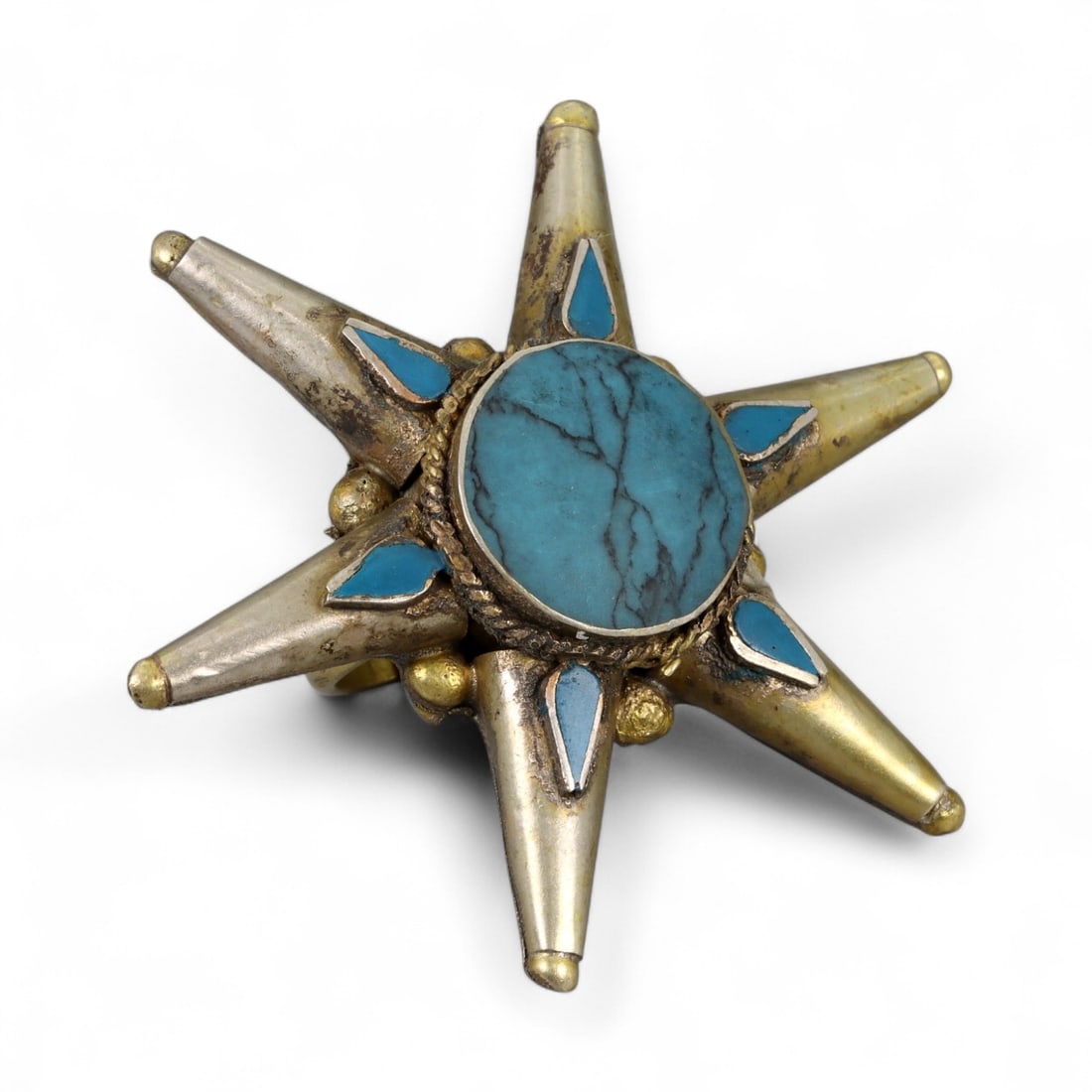 Antique Central Asian Starburst Silver Ring with Turquoise and Enamel, c. 19th-20th Century, 17g: This impressive antique silver ring captures the cosmic artistry of Central Asian jewelry traditions from the 19th to early 20th century. Designed in a radiant starburst form, the ring projects eight 