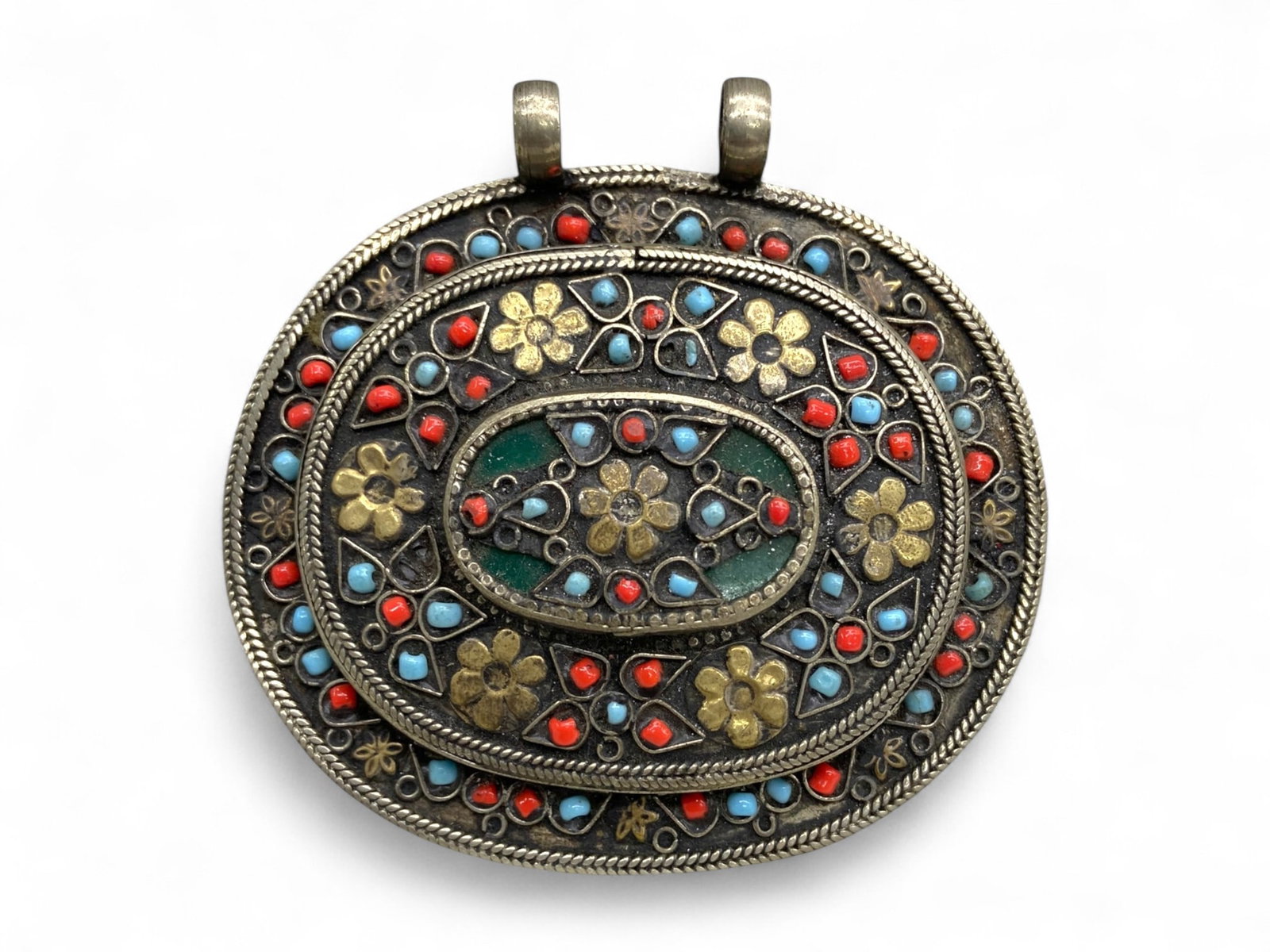Antique Himalayan Silver-Gilt Amulet Pendant with Coral and Turquoise Inlay, 19th-20th Century 82g: This ornate Himalayan pendant, dating to the 19th-20th century, is a vibrant example of regional amulet jewelry blending protective symbolism with rich artistry. Weighing 82 grams and measuring 8 cm, 