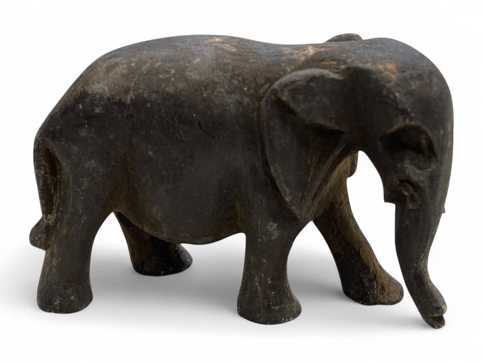Antique South Asian Elephant Effigy, c. 18th-19th Century, 32g, 5cm: This antique elephant effigy, carved with a simple yet expressive form, originates from South Asia, where elephants have long been revered as emblems of wisdom, strength, and royal authority. Dating t