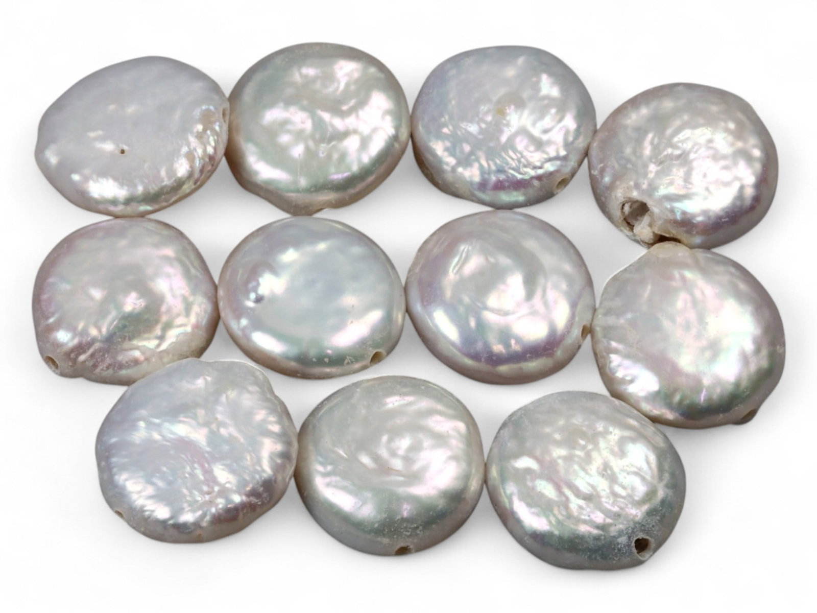 Chinese Freshwater Coin Pearl Bead Lot, 12mm 8.6g: This refined lot of Chinese freshwater coin pearls radiates a soft, luminous glow with overtones of rose, silver, and pale lavender. Each pearl measures around 12mm, their flattened, rounded shapes pr