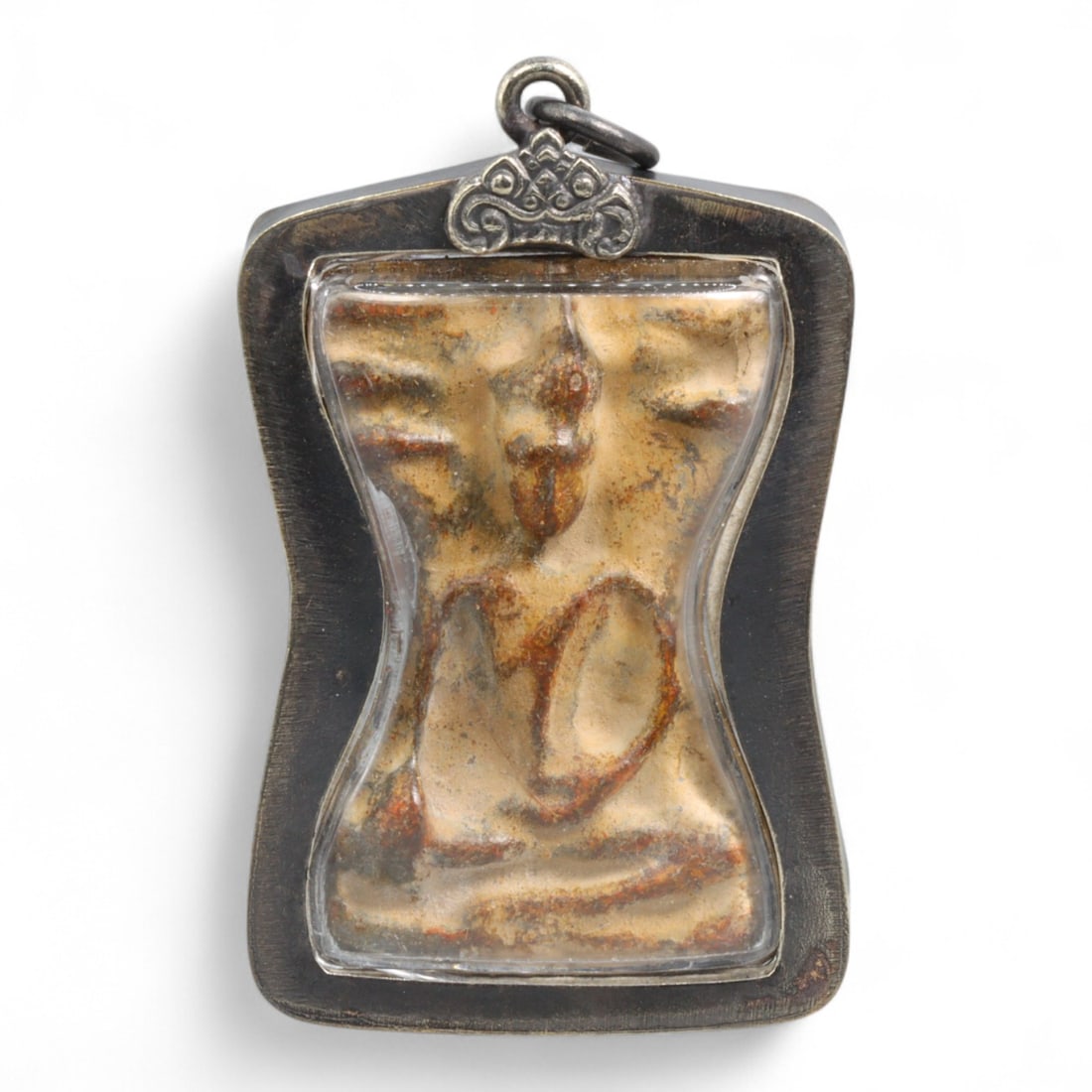Antique Thai Rattanakosin Era Hourglass Bodhisattva Amulet in Metal Frame, c. 19th-20th Century, 38g: This antique Thai amulet presents a rare hourglass-shaped frame housing a stylized Bodhisattva figure, deeply rooted in Thailand's devotional Rattanakosin-era artistry. Likely crafted in the late 19th