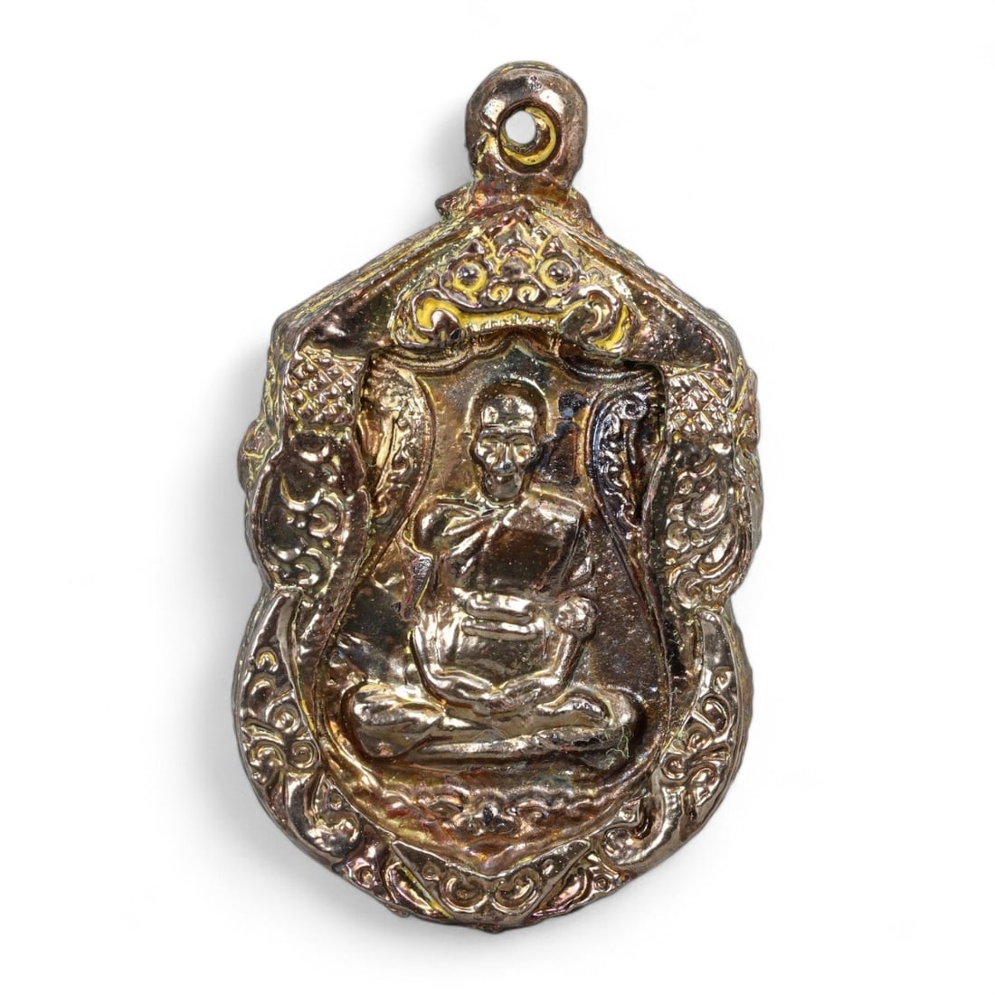 Antique Thai Luang Phor Monk Naga-Frame Bronze Medallion Amulet, c. Late 20th Century CE 28g: This ornate bronze amulet features a revered Luang Phor monk seated in serene meditation, enclosed within an intricately cast naga-framed medallion form. The arched border, flanked by stylized serpent