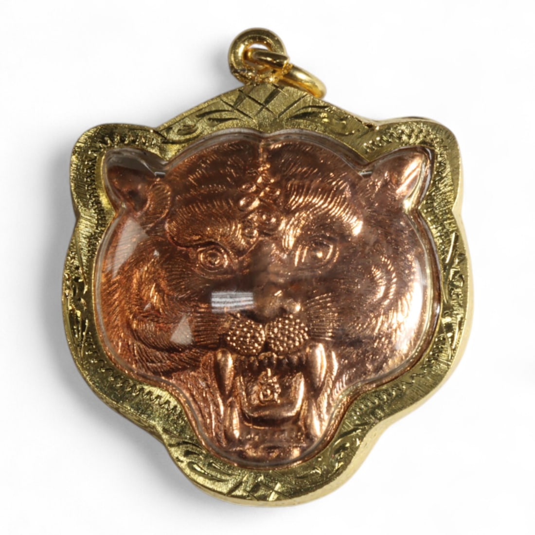 Vintage Thai Tiger Spirit Amulet Copper Casting in Gilt Frame, 20th Century, 21g: This vintage Thai amulet features the powerful image of a roaring tiger, finely cast in copper and framed in a gilt brass setting with protective glass. Shaped to follow the contours of the tiger's he