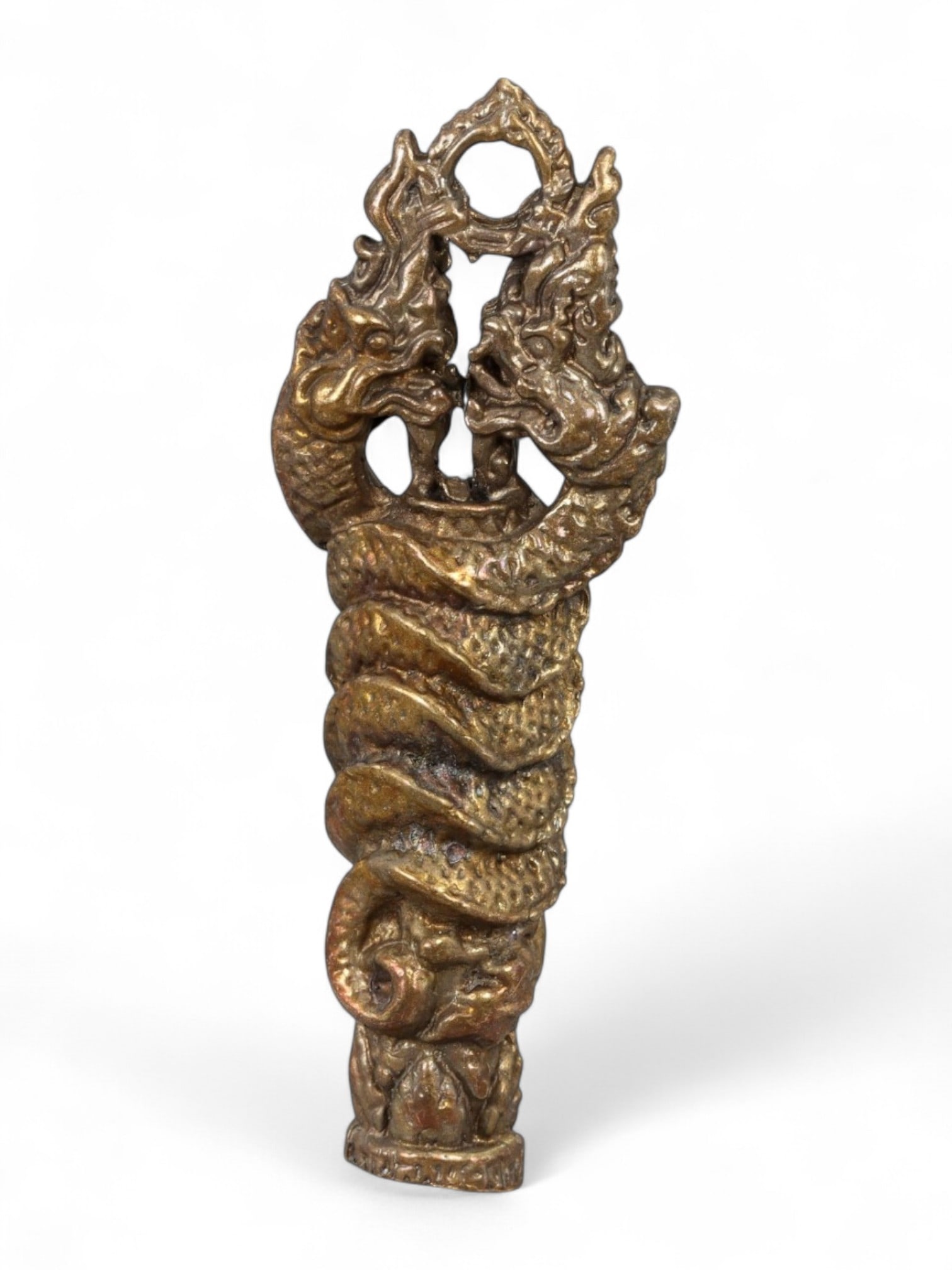 Antique Thai Rattanakosin Twin Naga Entwined Cosmic Pillar Amulet, Bronze, c. 19th Century CE [18g]: This majestic bronze amulet from 19th-century Thailand is a masterful representation of the entwined Naga motif-two serpent deities coiling upward in perfect synchronicity, forming a symbolic cosmic p