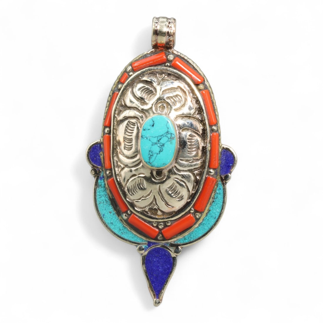 Tibetan Floral-Engraved Turquoise Coral Inlay Oval Pendant, Himalayan, 36g: This striking oval pendant from the Himalayas unites detailed repousse metalwork with vibrant gemstone inlay, reflecting the refined balance between artistic elegance and spiritual intent in Tibetan j