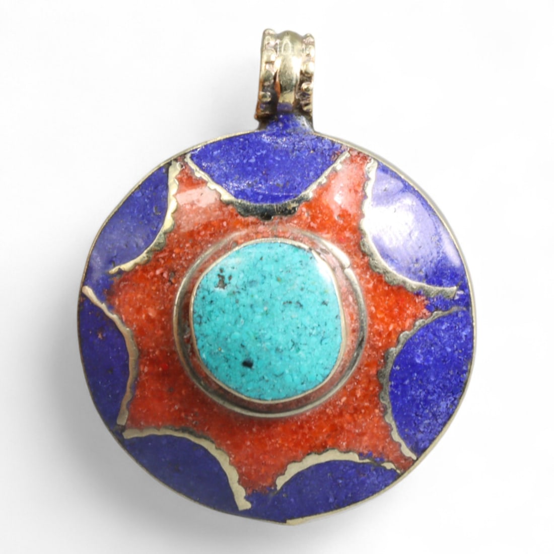 Tibetan Solar Mandala Pendant in Turquoise Coral Lapis Enamelwork, 30g: Radiant and symbolic, this Tibetan pendant captures the brilliance of cosmic design through a bold solar mandala motif. At its center lies a turquoise cabochon - vivid and sky-like - set within a glow