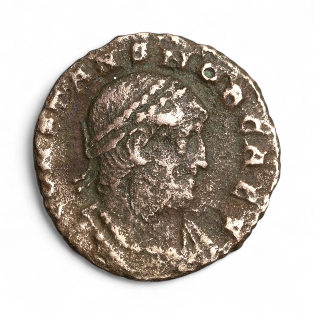ROMAN EMPIRE: Imperial Authority - Bronze Coin, c. 1st-3rd Century AD, 17mm: Struck during the turbulent decades of the later Roman Empire, this 19mm bronze coin reflects the enduring symbolism of imperial control amidst crisis. Its compact yet deliberate design likely feature