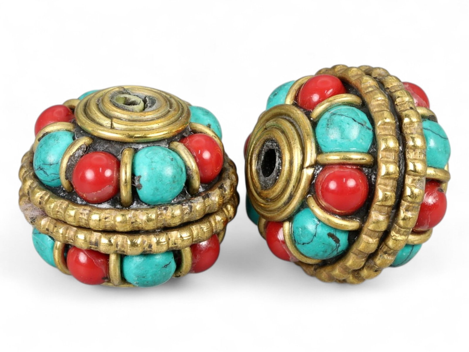 Vintage Himalayan Tribal Turquoise Coral Brass Bead Pair, 20th Century, 1.5cm: This finely crafted pair of vintage Himalayan beads highlights the vibrant aesthetic of mountain jewelry traditions. Each bead measures 1.5 cm and is constructed with alternating turquoise and coral c