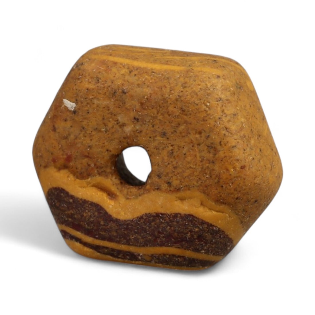 Ancient Indus Valley Fossilized Stromatolite Bead, c. 3rd-2nd Millennium BCE, 1cm: This remarkable bead is carved from fossilized stromatolite, a stone composed of layered mineral deposits created by some of Earth's earliest microbial life. Stromatolite beads were especially prized 