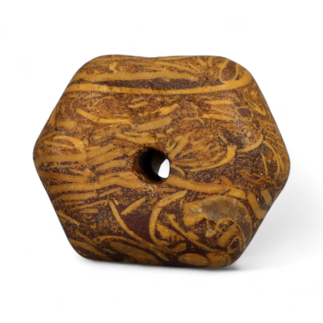 Ancient Indus Valley Fossilized Stromatolite Bead, c. 3rd-2nd Millennium BCE, 1cm: This remarkable bead is carved from fossilized stromatolite, a stone composed of layered mineral deposits created by some of Earth's earliest microbial life. Stromatolite beads were especially prized 