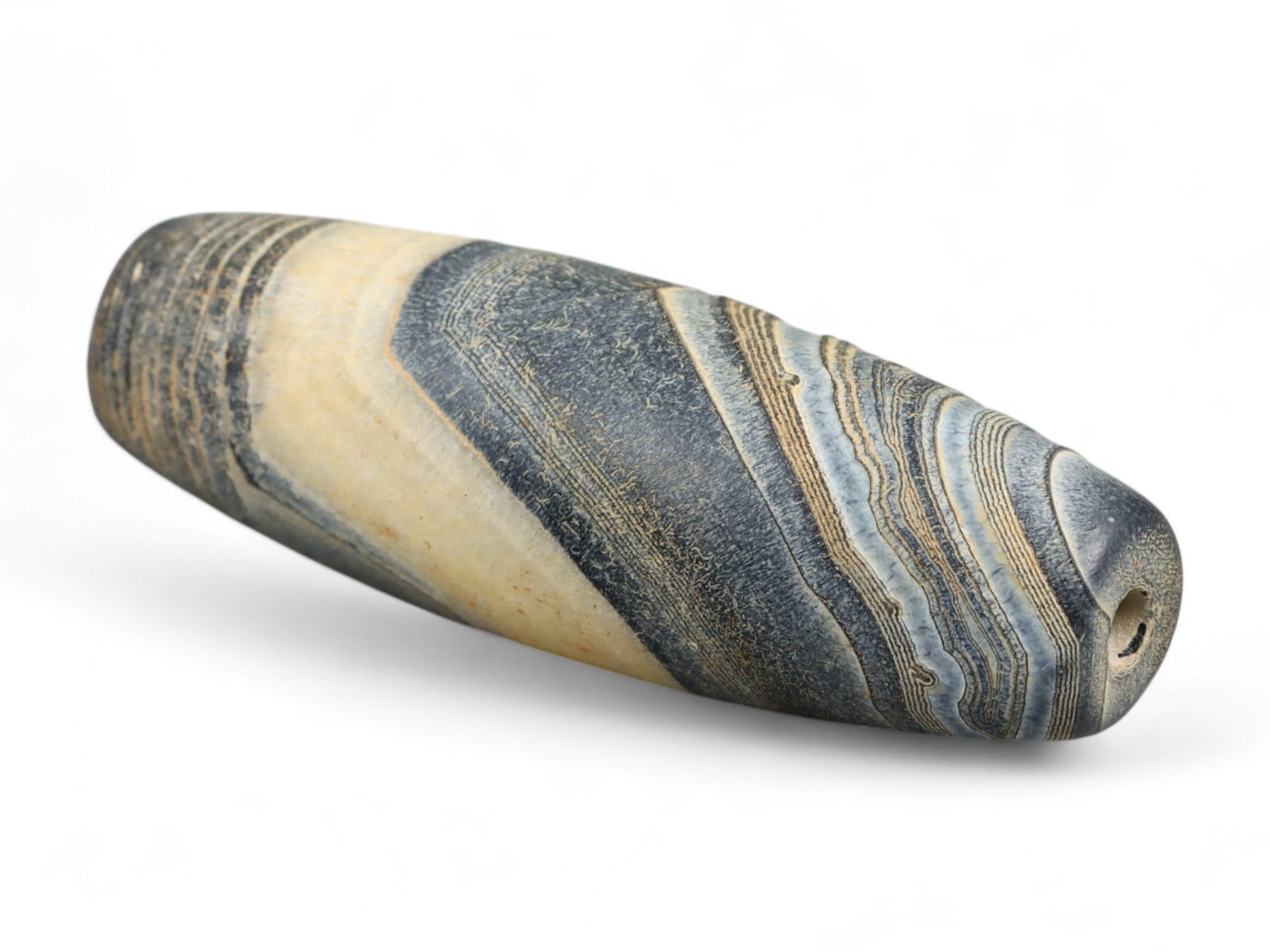Ancient Gandhara Banded Sulaimani Agate Bead, c. 1st-3rd Century CE, 3cm: This striking banded agate bead, often referred to as a Sulaimani bead, originates from the Gandhara region, c. 1st-3rd century CE, during the height of the Kushan Empire. Gandhara, straddling present