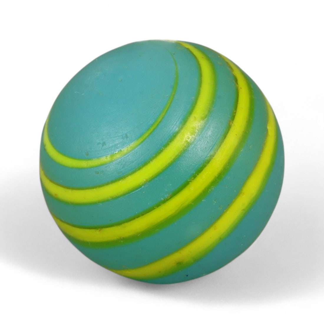 Vintage Swirled Pattern Glass Marble, c. Early-Mid 20th Century, 1.6cm: This charming vintage marble, is crafted from glass with a striking swirl design. Its spiraled pattern, creates a mesmerizing effect that reflects the playful artistry of traditional marble-making. Ea